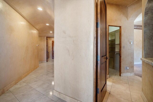 9301 Black Farm Ln NW, Albuquerque, NM 87114 - hallway with arched walkways, light tile patterned floors, and recessed lighting