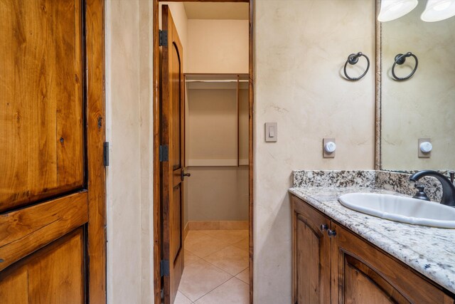 9301 Black Farm Ln NW, Albuquerque, NM 87114 - spacious closet featuring tile patterned flooring