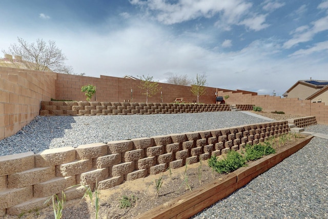 1854 Valle Vista Rd NW, Los Lunas, NM 87031 - fenced backyard with a vegetable garden