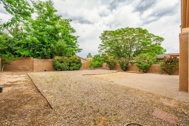 7113 Avignon Ct NW, Albuquerque, NM 87114 - fenced backyard with a patio