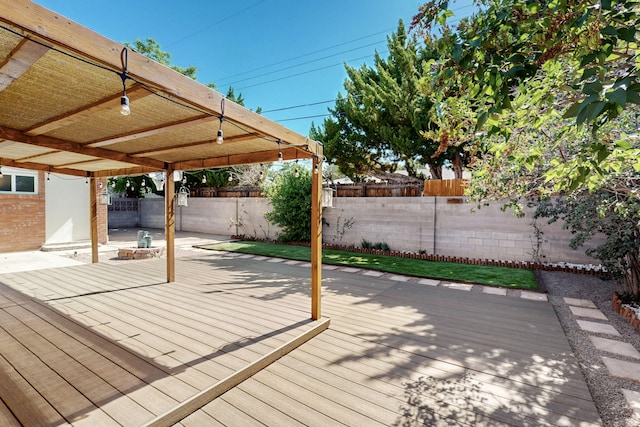 2912 Alcazar St NE, Albuquerque, NM 87110 - wooden terrace with a fenced backyard