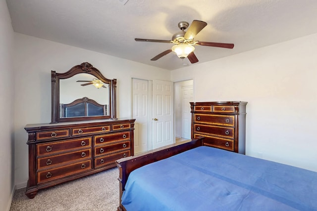 402 Calle Don Santiago NE, Los Lunas, NM 87031 - carpeted bedroom featuring ceiling fan