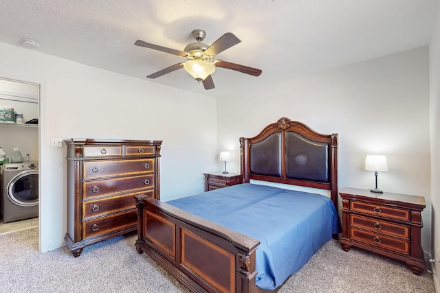 402 Calle Don Santiago NE, Los Lunas, NM 87031 - bedroom with washer / dryer, light carpet, and ceiling fan
