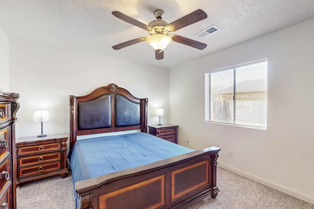 402 Calle Don Santiago NE, Los Lunas, NM 87031 - bedroom featuring carpet flooring, baseboards, a ceiling fan, and a textured ceiling
