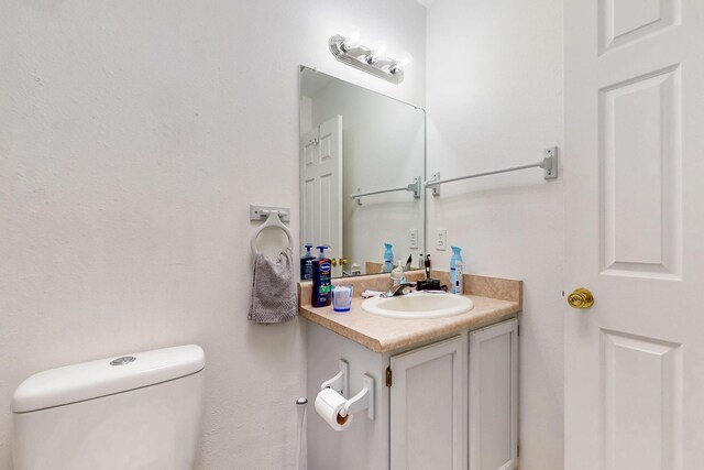 402 Calle Don Santiago NE, Los Lunas, NM 87031 - half bath featuring vanity and toilet