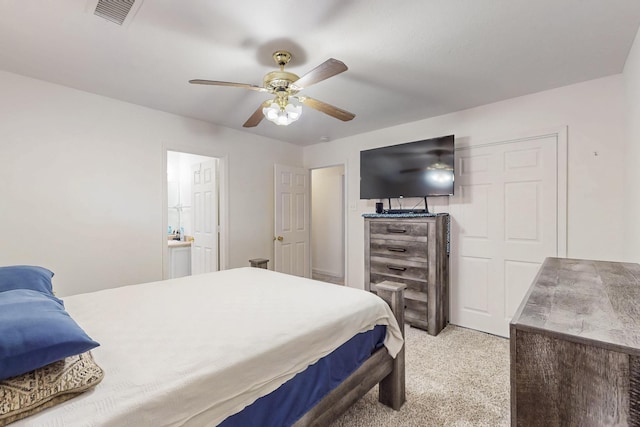 402 Calle Don Santiago NE, Los Lunas, NM 87031 - bedroom with light carpet and ceiling fan