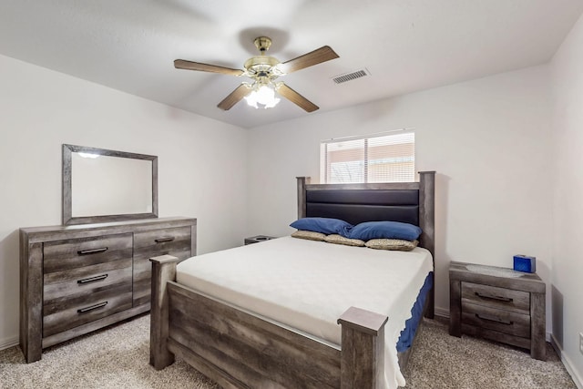 402 Calle Don Santiago NE, Los Lunas, NM 87031 - bedroom featuring light carpet, baseboards, and a ceiling fan