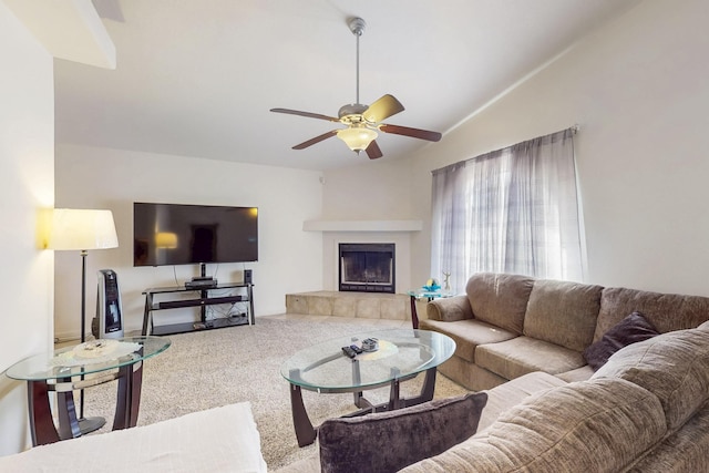 402 Calle Don Santiago NE, Los Lunas, NM 87031 - carpeted living room with ceiling fan, lofted ceiling, and a tile fireplace