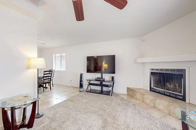 402 Calle Don Santiago NE, Los Lunas, NM 87031 - living room with tile patterned floors, ceiling fan, a tile fireplace, and baseboards