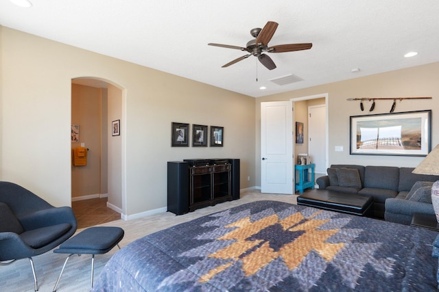 6413 Kings Cyn NE, Rio Rancho, NM 87144 - tiled bedroom featuring arched walkways, a ceiling fan, and recessed lighting