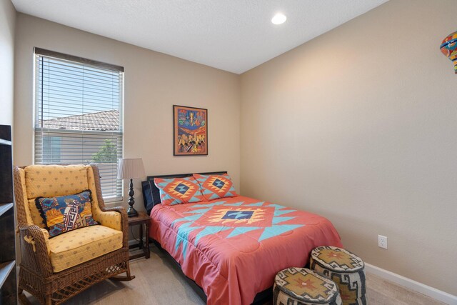 6413 Kings Cyn NE, Rio Rancho, NM 87144 - bedroom featuring light carpet, baseboards, and recessed lighting