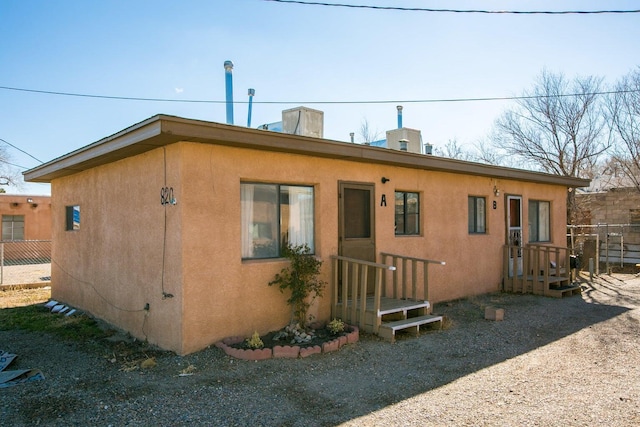 820 Apache Ave NW, Albuquerque, NM 87102 - back of property with stucco siding