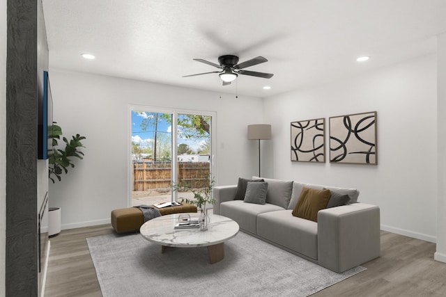 7525 Gill St NE, Albuquerque, NM 87109 - living room featuring ceiling fan, light wood finished floors, recessed lighting, and baseboards