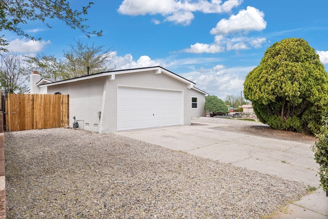 7525 Gill St NE, Albuquerque, NM 87109 - garage featuring driveway
