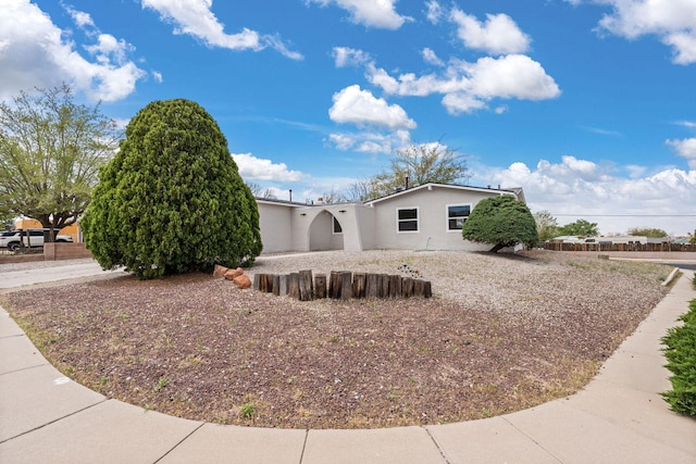 7525 Gill St NE, Albuquerque, NM 87109 - view of side of property with stucco siding