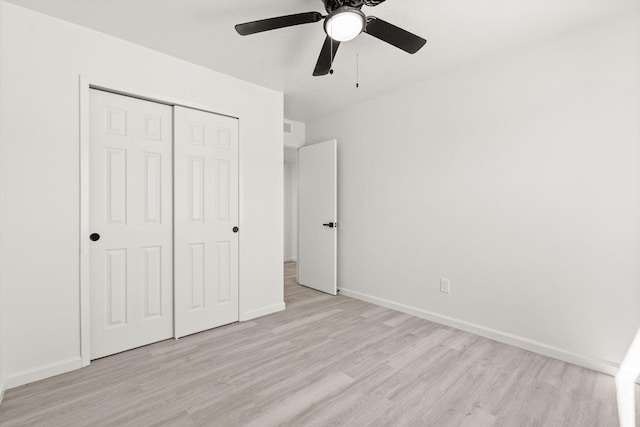 7525 Gill St NE, Albuquerque, NM 87109 - unfurnished bedroom featuring light wood-style flooring, a closet, baseboards, and ceiling fan