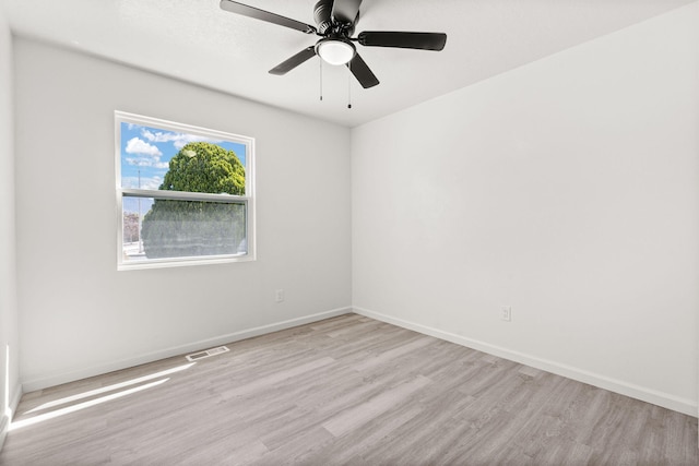 7525 Gill St NE, Albuquerque, NM 87109 - empty room with wood finished floors, baseboards, and a ceiling fan