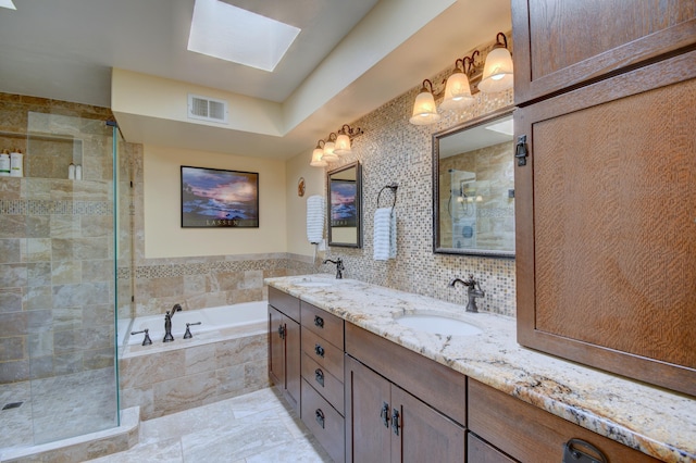 2865 Tramway Cir NE, Albuquerque, NM 87122 - full bath with a skylight, a garden tub, tiled shower, and double vanity