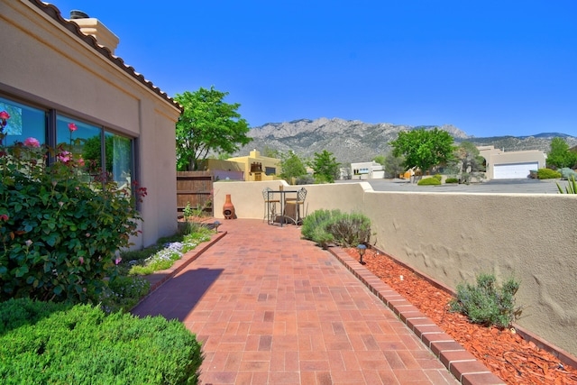 2865 Tramway Cir NE, Albuquerque, NM 87122 - view of patio featuring a mountain view