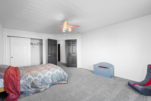 8935 Balsam Glade Rd NW, Albuquerque, NM 87114 - bedroom with carpet floors, a closet, and a ceiling fan