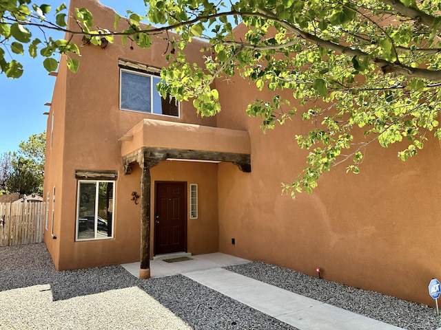 3032 Cochiti St NE, Rio Rancho, NM 87144 - view of front of home featuring stucco siding