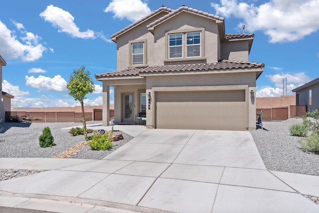 684 Turmalina Dr SE, Rio Rancho, NM 87124 - mediterranean / spanish-style house with a garage, stucco siding, driveway, and a tile roof