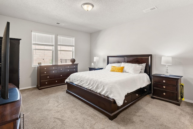 684 Turmalina Dr SE, Rio Rancho, NM 87124 - carpeted bedroom featuring a textured ceiling and baseboards