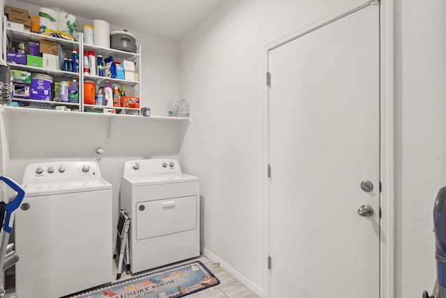 684 Turmalina Dr SE, Rio Rancho, NM 87124 - laundry area with separate washer and dryer and light wood finished floors