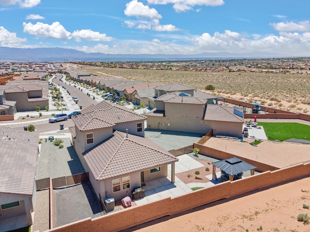 684 Turmalina Dr SE, Rio Rancho, NM 87124 - aerial view of residential area featuring a mountain backdrop