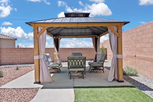 684 Turmalina Dr SE, Rio Rancho, NM 87124 - fenced backyard with a gazebo and a patio area