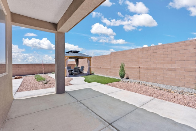 684 Turmalina Dr SE, Rio Rancho, NM 87124 - fenced backyard featuring a gazebo and a patio