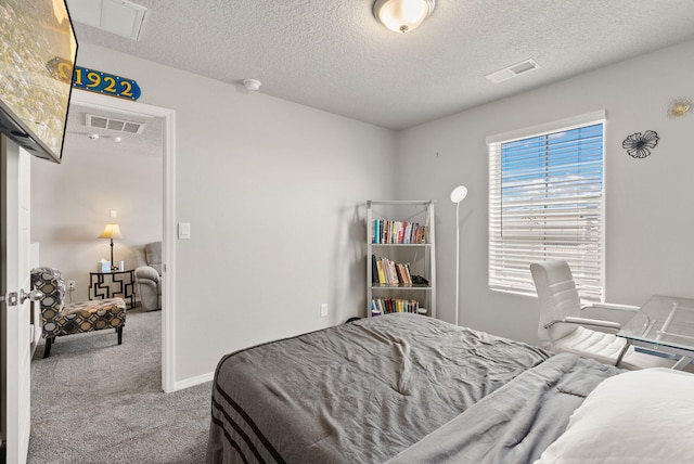 684 Turmalina Dr SE, Rio Rancho, NM 87124 - carpeted bedroom featuring a textured ceiling and baseboards