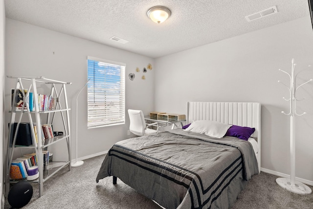 684 Turmalina Dr SE, Rio Rancho, NM 87124 - bedroom with carpet flooring, a textured ceiling, and baseboards