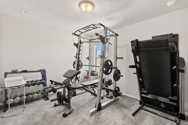 684 Turmalina Dr SE, Rio Rancho, NM 87124 - workout room with a textured ceiling and baseboards