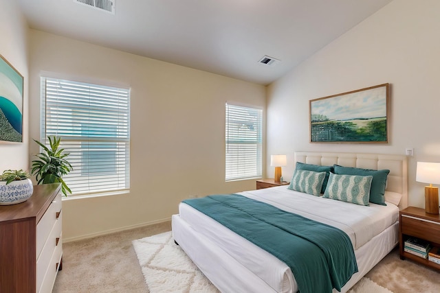 6501 San Antonio Dr NE Unit 2702, Albuquerque, NM 87109 - bedroom featuring carpet floors, baseboards, and lofted ceiling