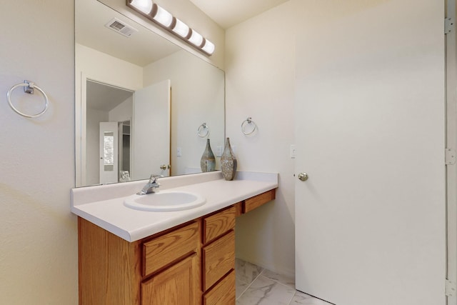 6501 San Antonio Dr NE Unit 2702, Albuquerque, NM 87109 - bathroom with marble finish floors and vanity