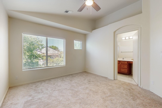 6501 San Antonio Dr NE Unit 2702, Albuquerque, NM 87109 - empty room featuring light colored carpet and a ceiling fan