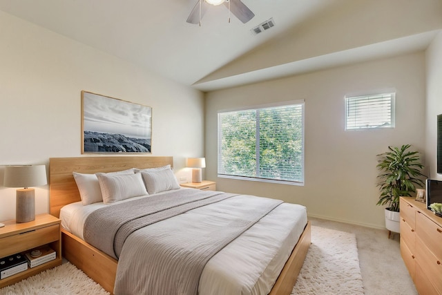 6501 San Antonio Dr NE Unit 2702, Albuquerque, NM 87109 - bedroom featuring vaulted ceiling, light carpet, a ceiling fan, and baseboards