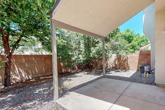 6501 San Antonio Dr NE Unit 2702, Albuquerque, NM 87109 - fenced backyard with a patio area and cooling unit
