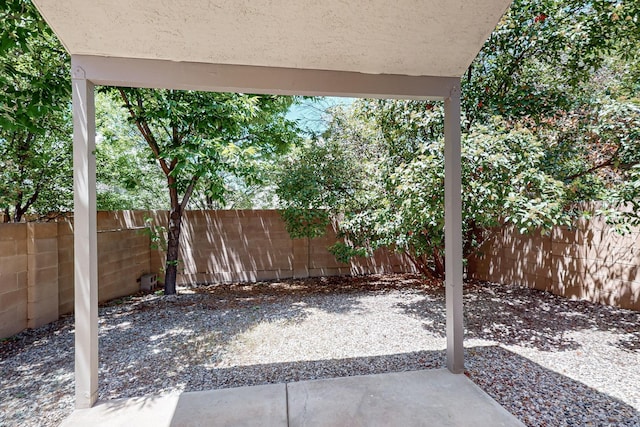 6501 San Antonio Dr NE Unit 2702, Albuquerque, NM 87109 - fenced backyard featuring a patio area