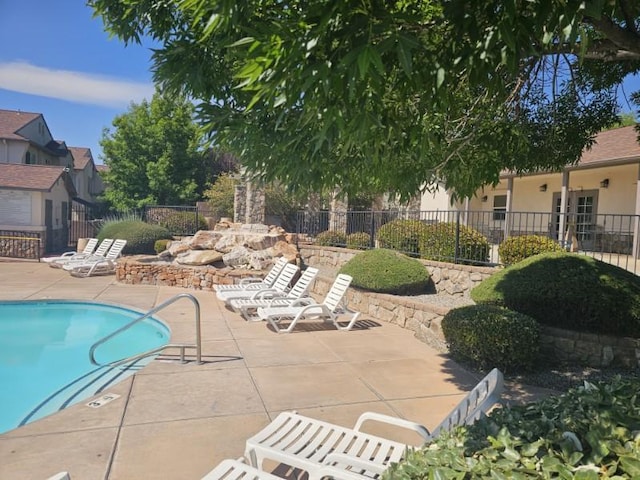 6501 San Antonio Dr NE Unit 2702, Albuquerque, NM 87109 - community pool featuring a patio