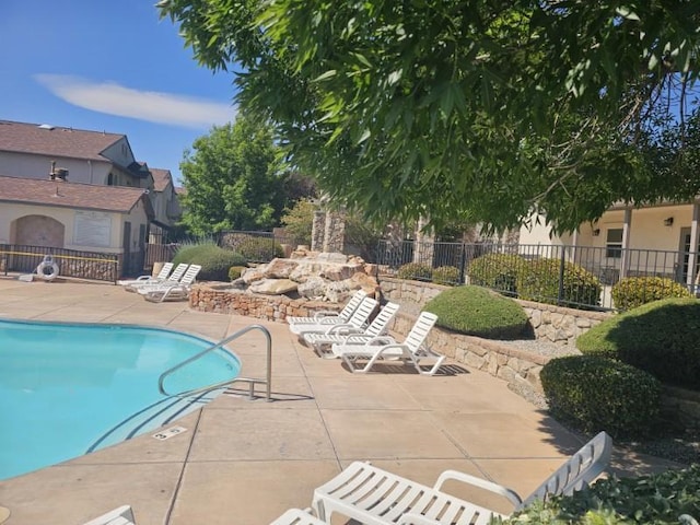 6501 San Antonio Dr NE Unit 2702, Albuquerque, NM 87109 - community pool with a patio area