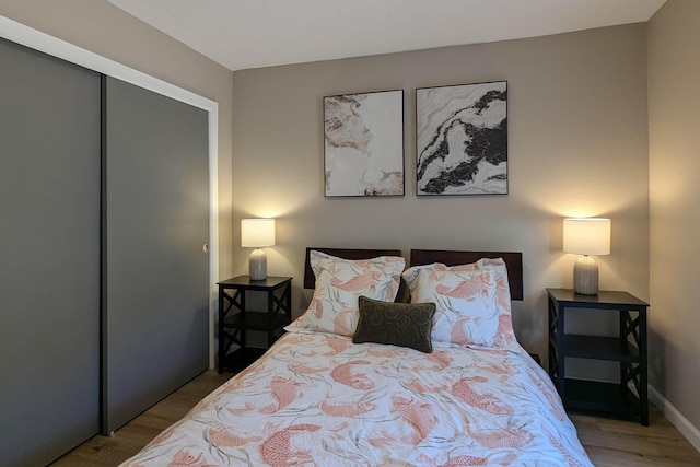 10031 Guadalupe Trl NW Unit A, Albuquerque, NM 87114 - bedroom with wood finished floors and a closet