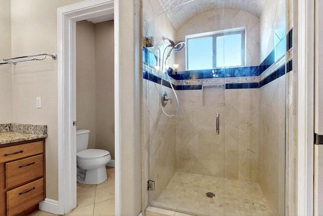 6505 Basket Weaver Ave NW, Albuquerque, NM 87114 - bathroom with toilet, a stall shower, vanity, and tile patterned flooring