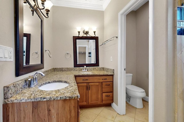 6505 Basket Weaver Ave NW, Albuquerque, NM 87114 - bathroom with crown molding, double vanity, tile patterned flooring, and toilet