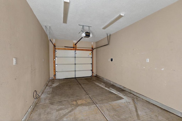 6505 Basket Weaver Ave NW, Albuquerque, NM 87114 - garage with a garage door opener and baseboards