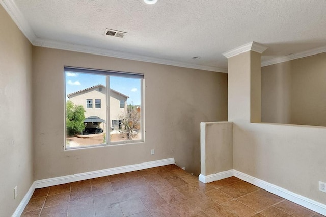 6505 Basket Weaver Ave NW, Albuquerque, NM 87114 - empty room featuring ornamental molding, a textured ceiling, tile patterned flooring, and baseboards
