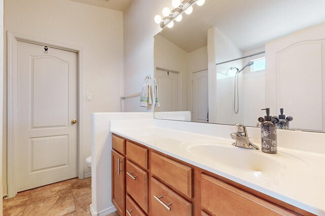 9731 Puccini Trl NW, Albuquerque, NM 87114 - bathroom with vanity and toilet