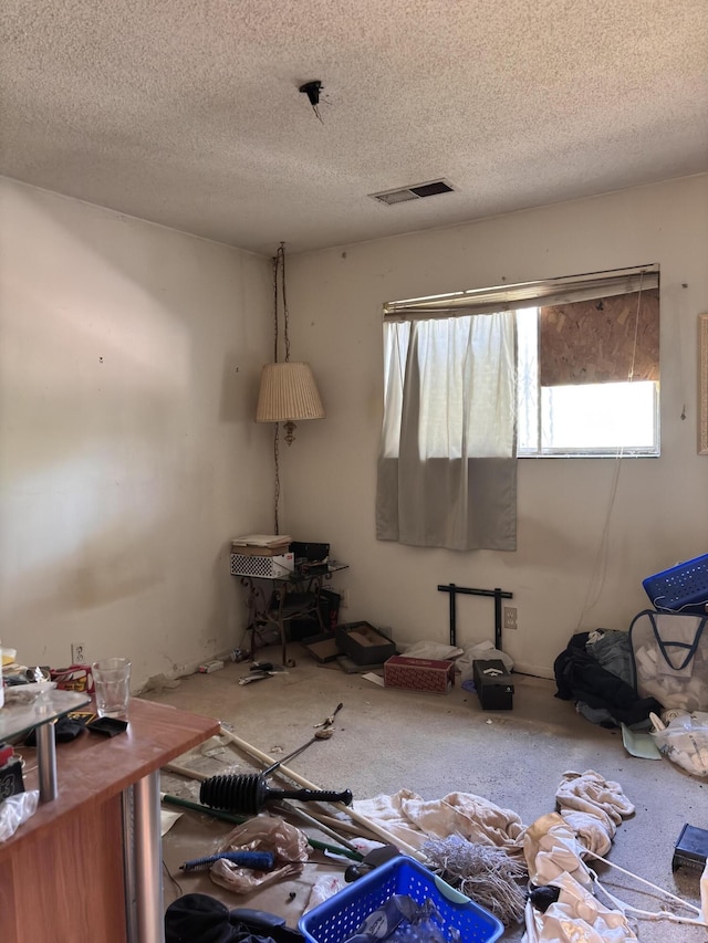 806 Oreja De Oro Dr SE, Rio Rancho, NM 87124 - unfurnished room featuring a textured ceiling