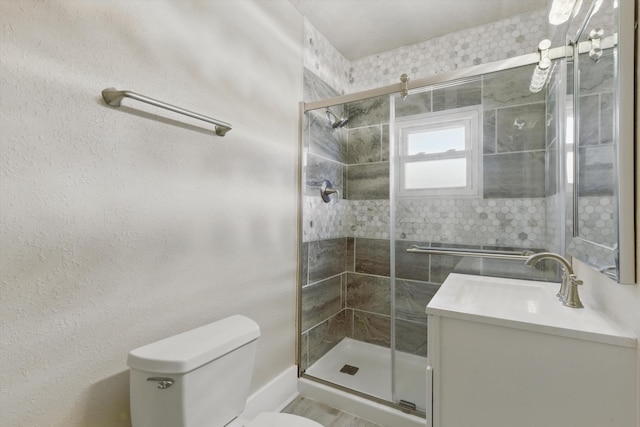 417 8th St NW, Albuquerque, NM 87102 - full bathroom featuring toilet, a stall shower, and vanity